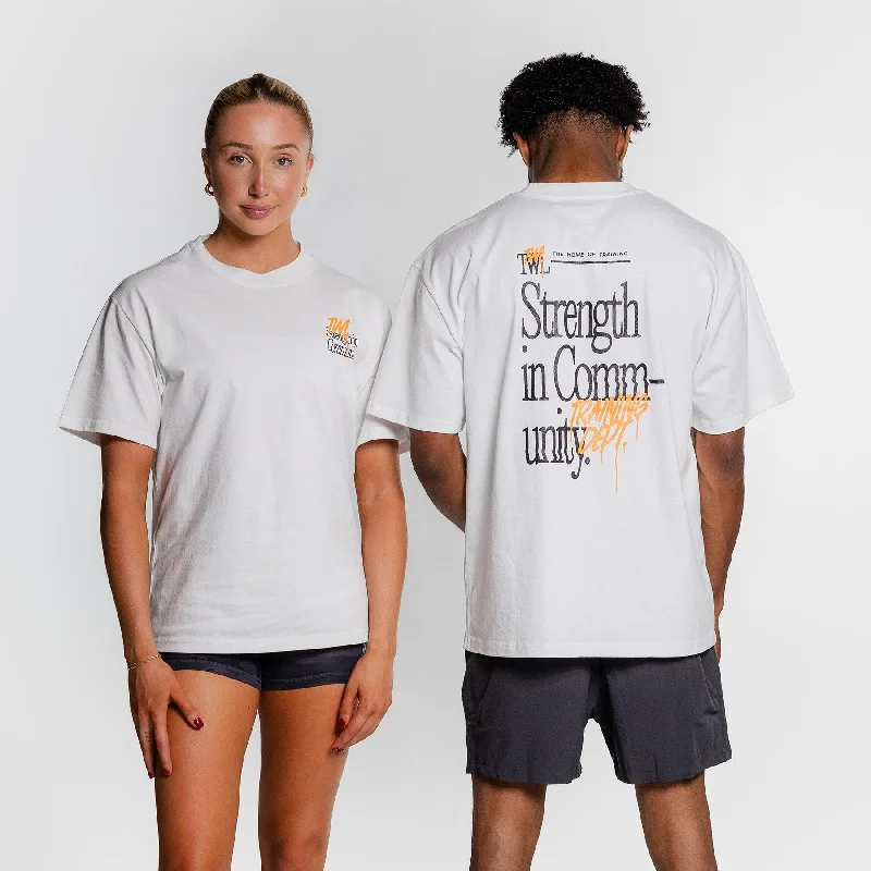 TWL - LIFESTYLE OVERSIZED T-SHIRT - STRENGTH IN COMMUNITY - FADED WHITE/ORANGE Chenille Brocade Lace TWL - LIFESTYLE OVERSIZED T-SHIRT - STRENGTH IN COMMUNITY - FADED WHITE/ORANGE Chenille Brocade Lace